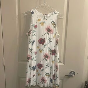 White dress with floral print. Worn twice in great condition.